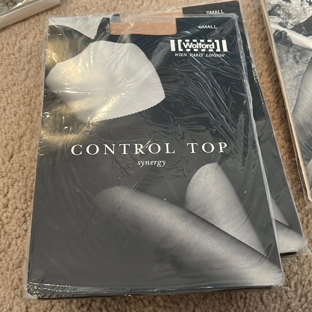 Wolford control top synergy panty hose. Size small. Color Cosmetic.